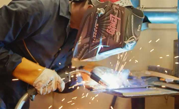 Image of a student practicing welding