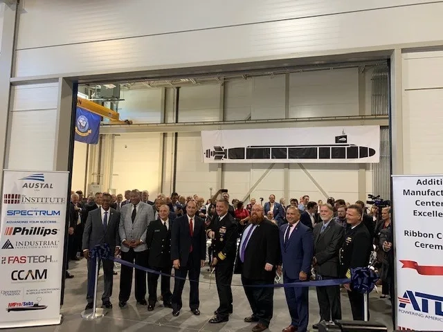 Officials at a ribbon cutting event