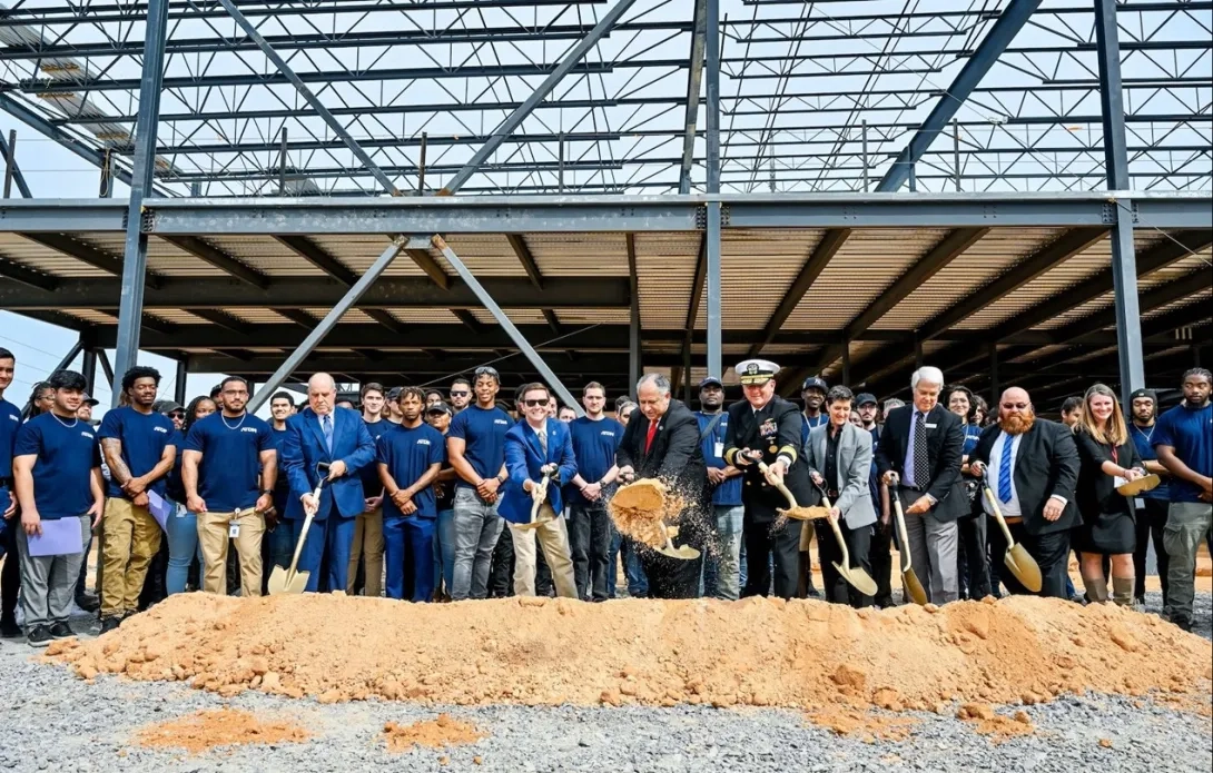 Group of people with shovels at a ground-breaking ceremony