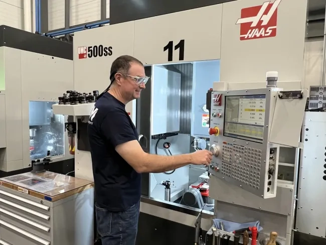 Man using a CNC machine